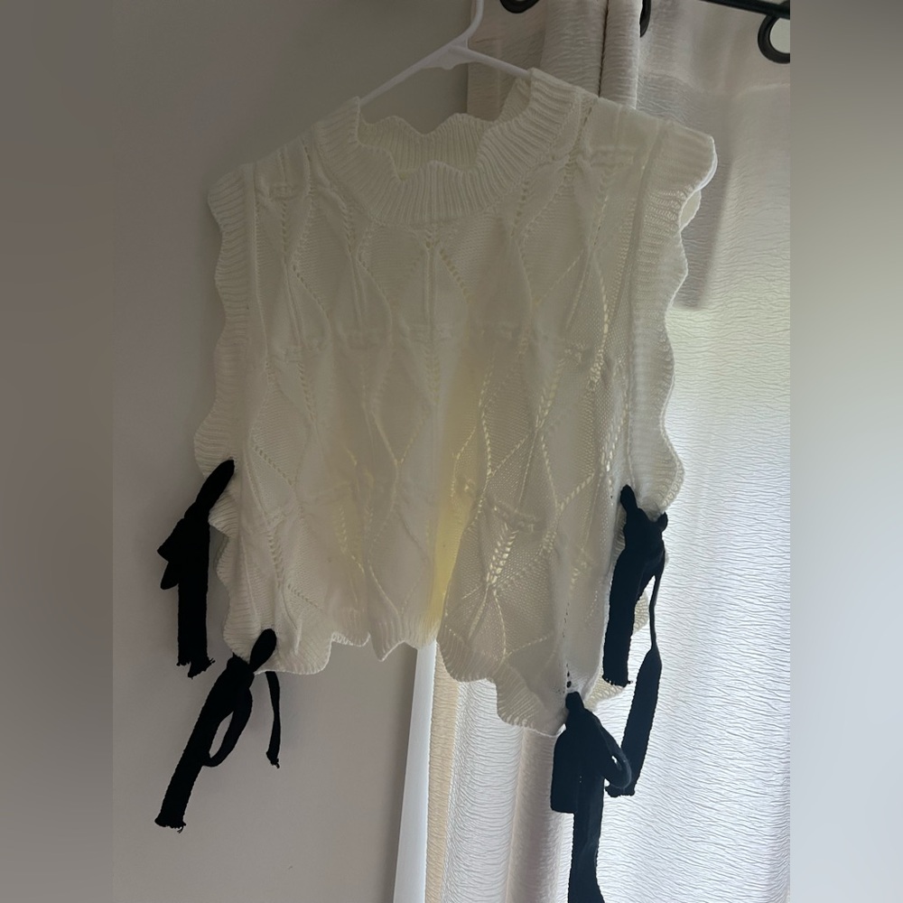 Cute boutique sweater tie top
